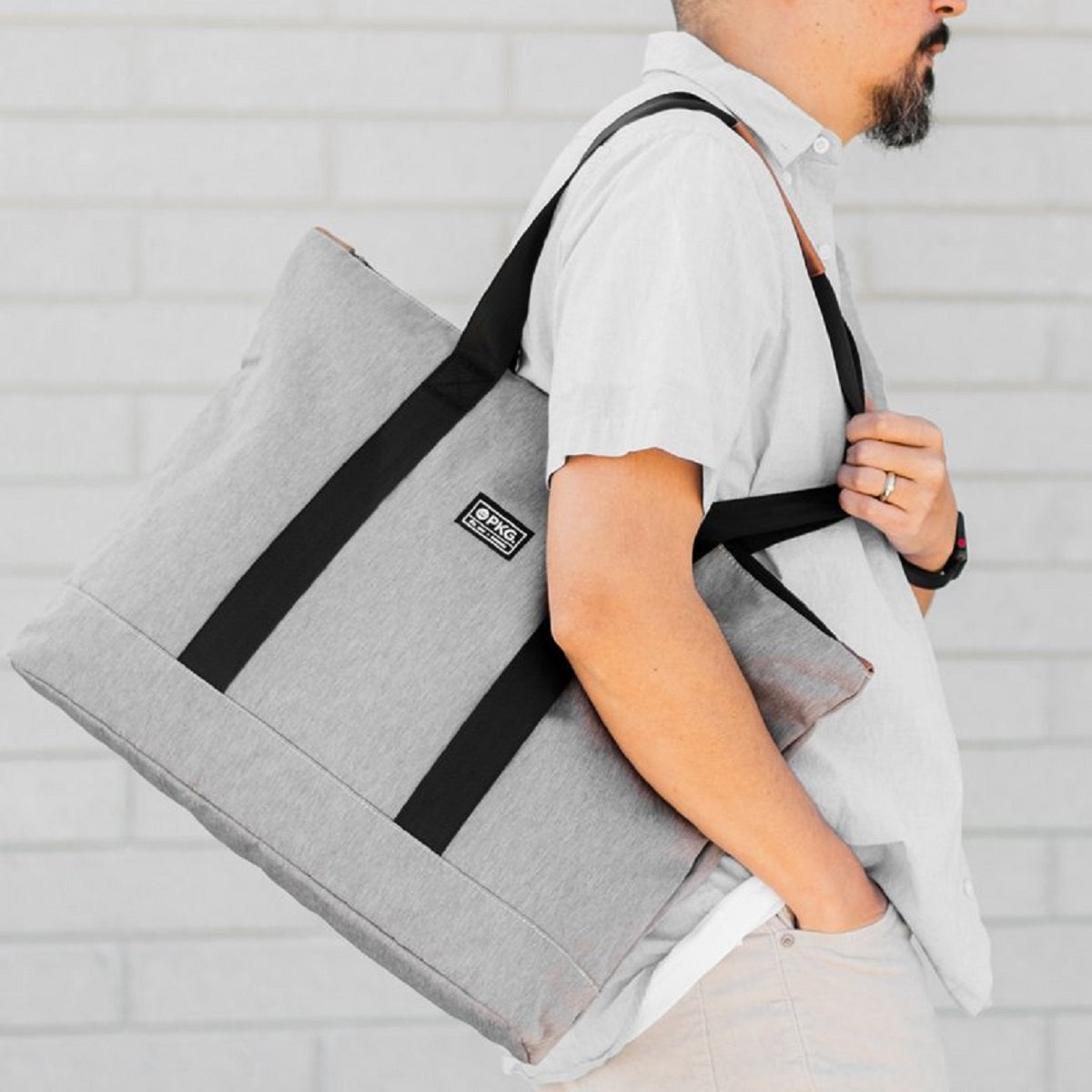 PKG_Lawrence_grey_tote_on_man.jpg